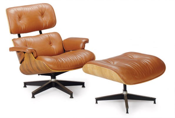 A WALNUT AND BROWN LEATHER '670/671' UPHOLSTERED LOUNGE CHAIR AND OTTOMAN,