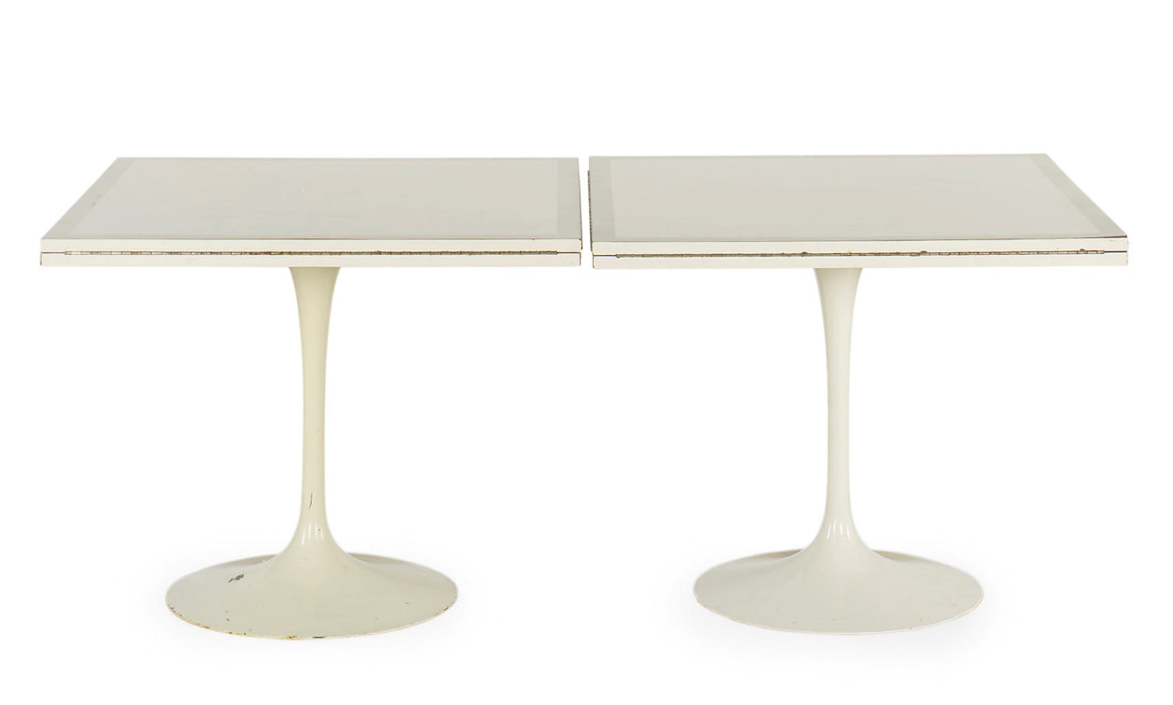 A PAIR OF LAMINATE FOLD-OUT OCTAGONAL DINING TABLES,