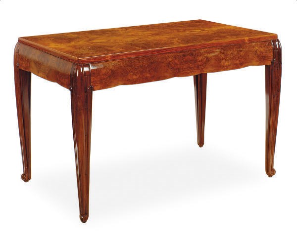 AN ART DECO WALNUT CENTER TABLE,