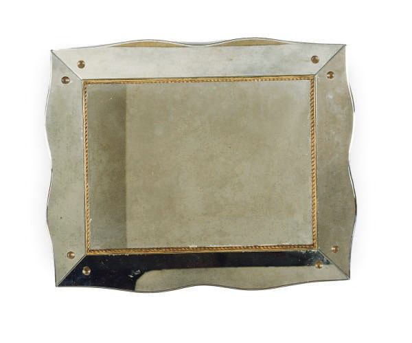 A BEVELED GLASS AND GILTWOOD MIRROR,