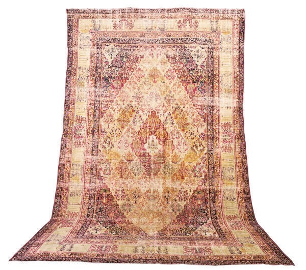 A KIRMAN CARPET,