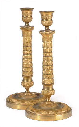 A PAIR OF CHARLES X ORMOLU CANDLESTICKS,