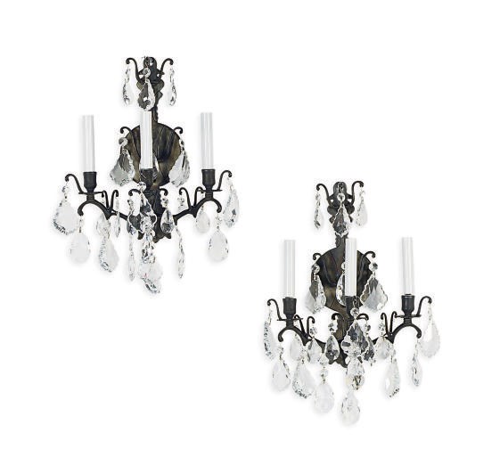 A PAIR OF PATINATED-METAL AND GLASS THREE-BRANCH WALL-LIGHTS,