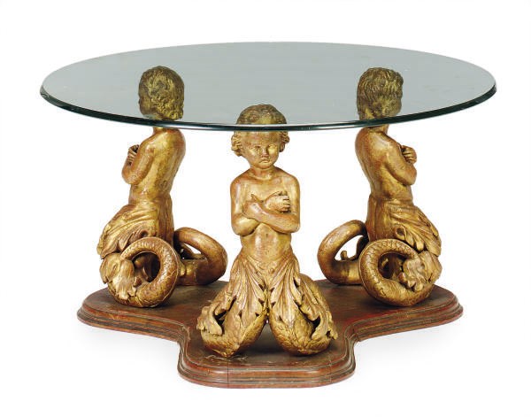 A GILT-BRONZE AND GLASS FIGURAL LOW TABLE,