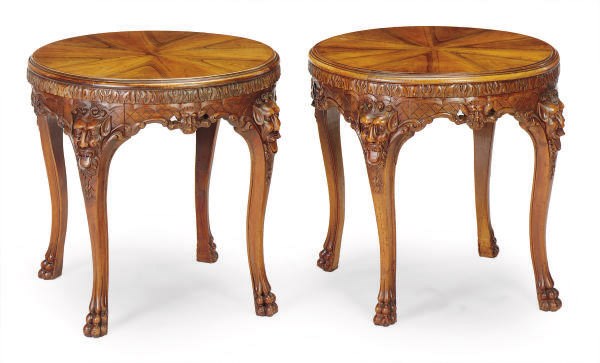 A PAIR OF CARVED WALNUT CIRCULAR SIDE TABLES,