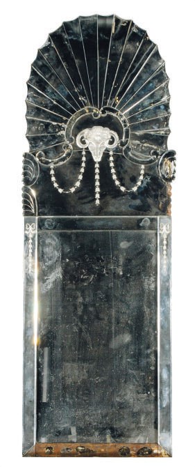 AN ITALIAN ENGRAVED GLASS MIRROR,
