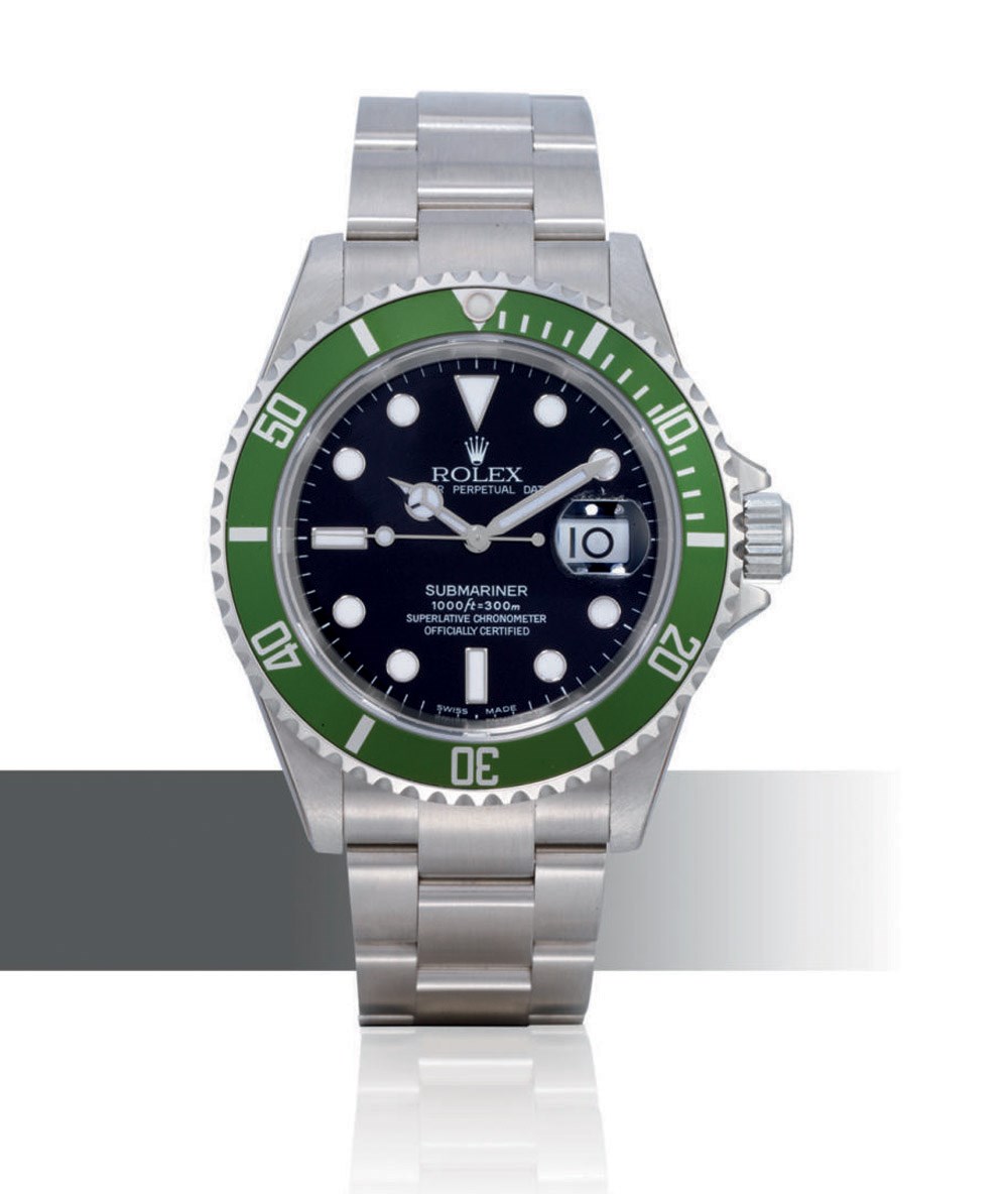 ROLEX, SUBMARINER, REF. 16610

STAINLESS STEEL AUTOMATIC BRACELET WATCH WITH GREEN BEZEL AND DATE DISPLAY