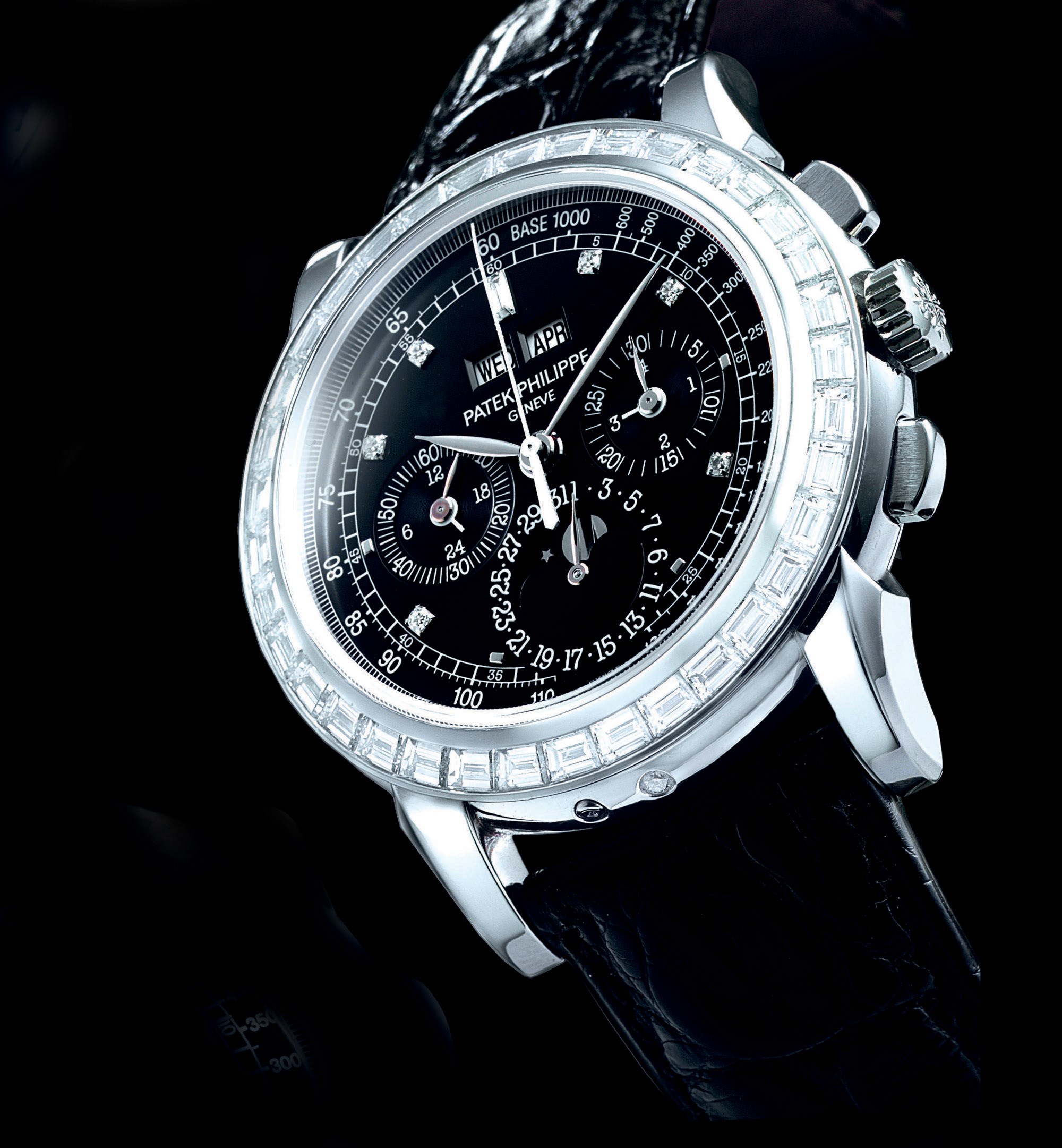PATEK PHILIPPE, REF. 5971P

PLATINUM MANUALLY-WOUND PERPETUAL CALENDAR CHRONOGRAPH WRISTWATCH WITH MOON PHASE DISPLAY AND DIAMOND-SET HOUR MARKERS, BEZEL SET WITH 36 BAGUETTE-CUT DIAMONDS