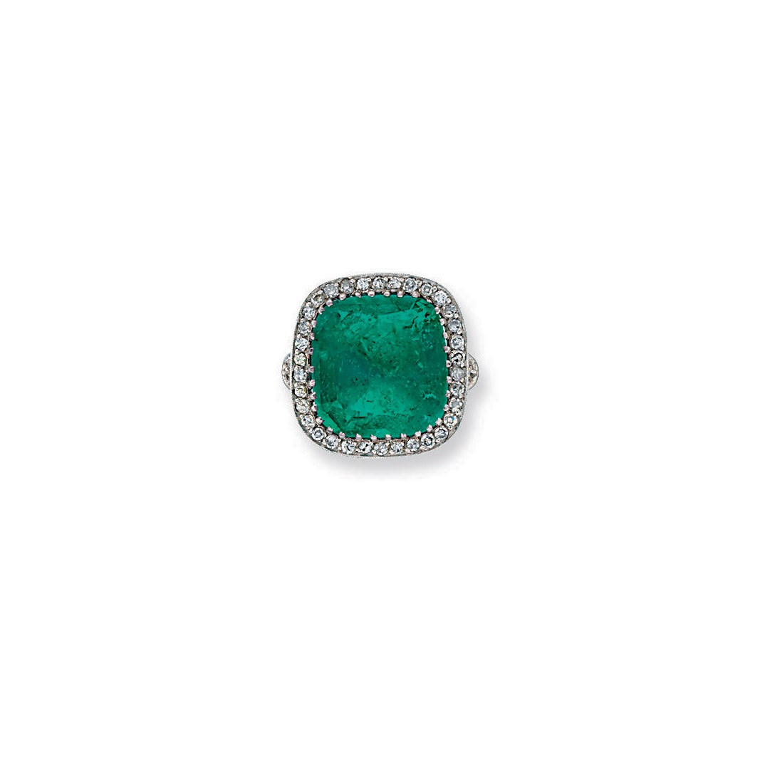 AN EMERALD AND DIAMOND RING