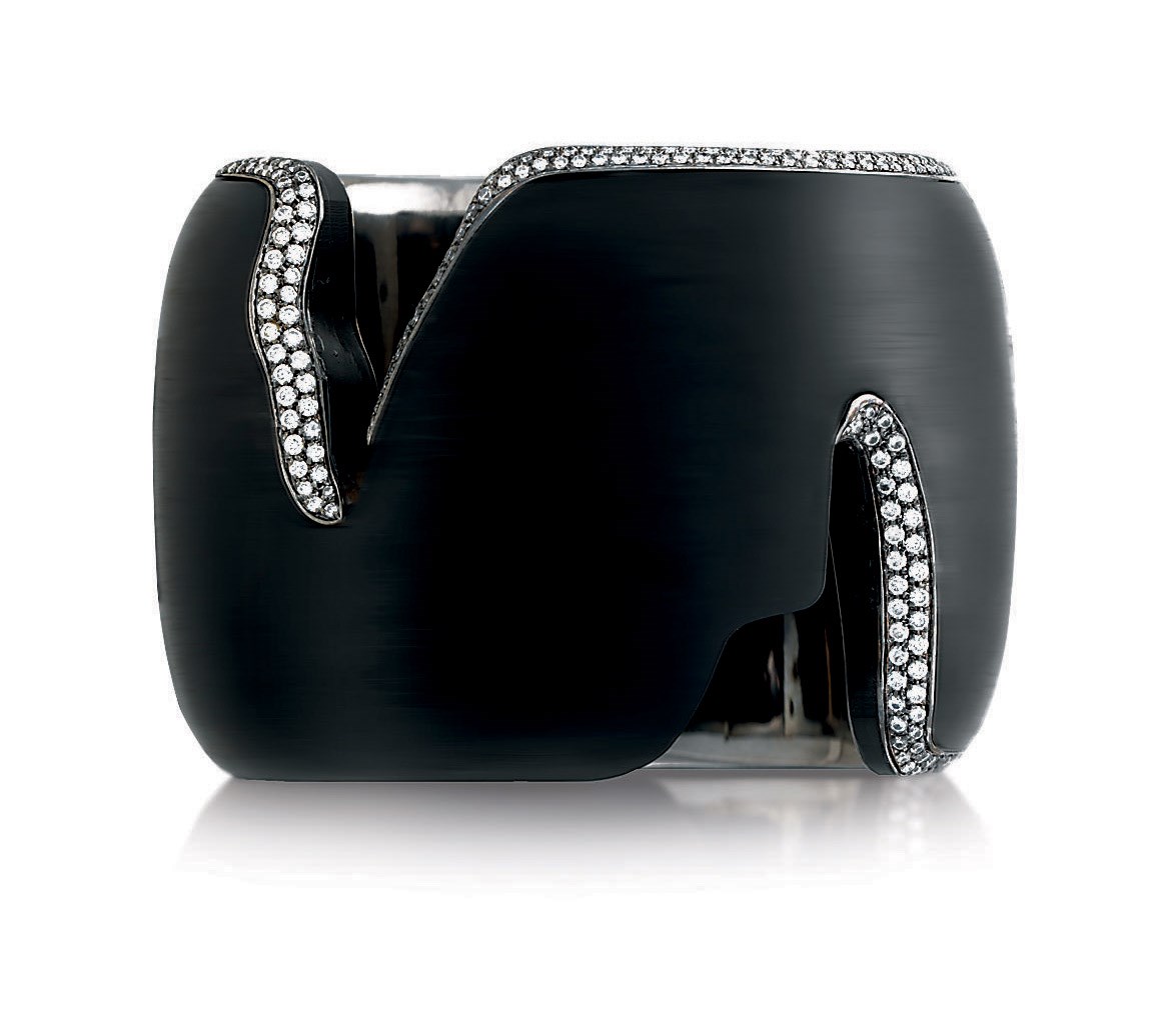 AN EBONY AND DIAMOND CUFF, BY NOOR