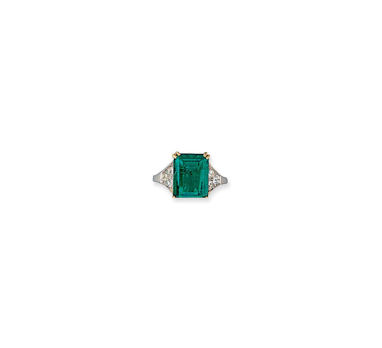 AN EMERALD AND DIAMOND RING