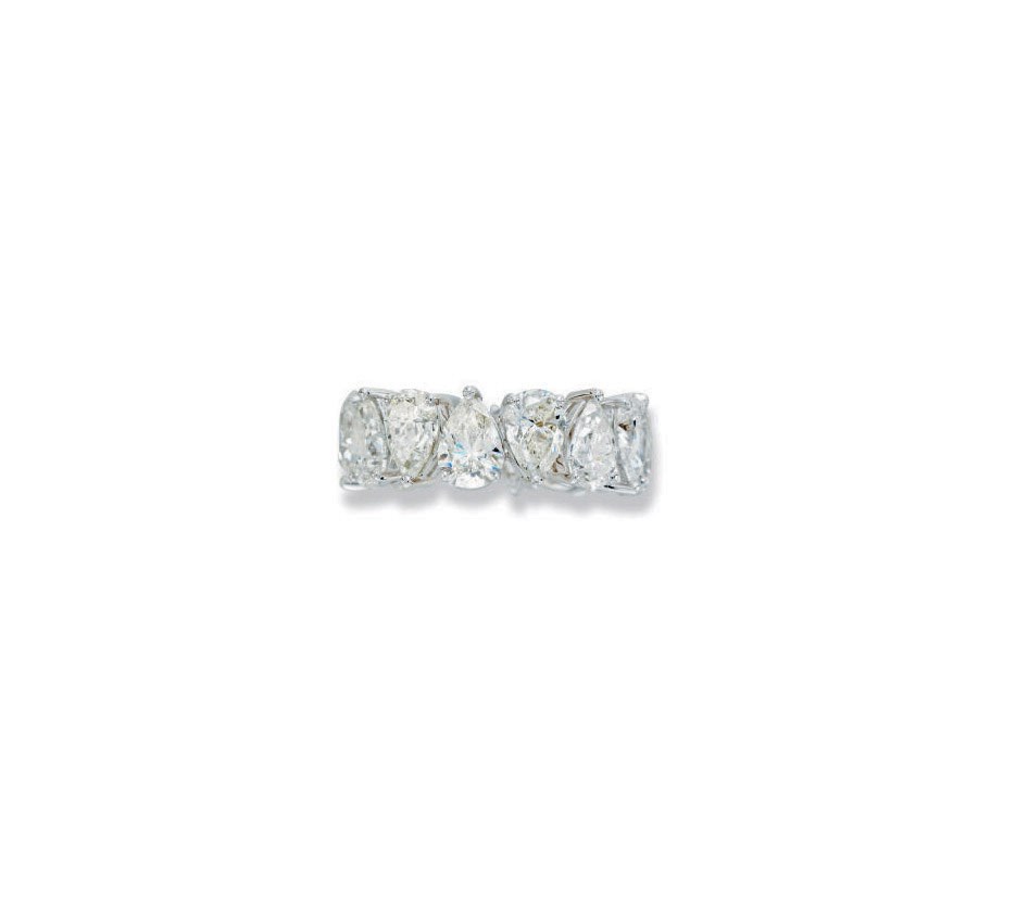 A DIAMOND ETERNITY RING, BY NSOULI