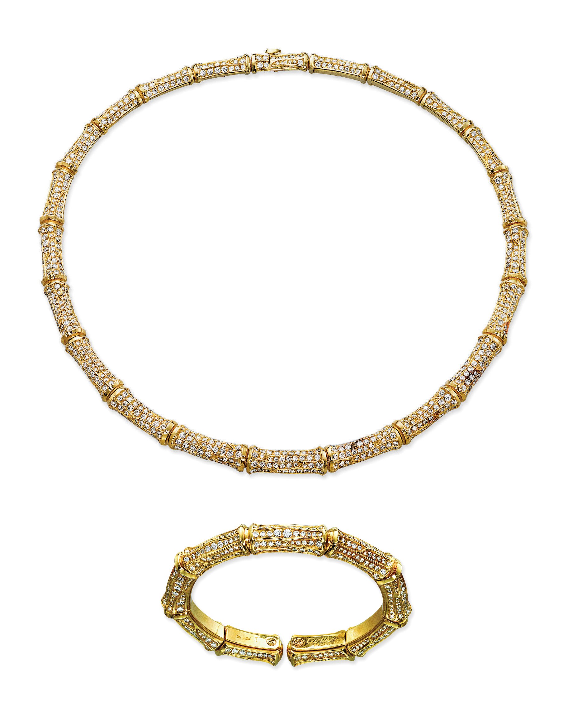 A DIAMOND 'BAMBOO' SUITE, BY CARTIER