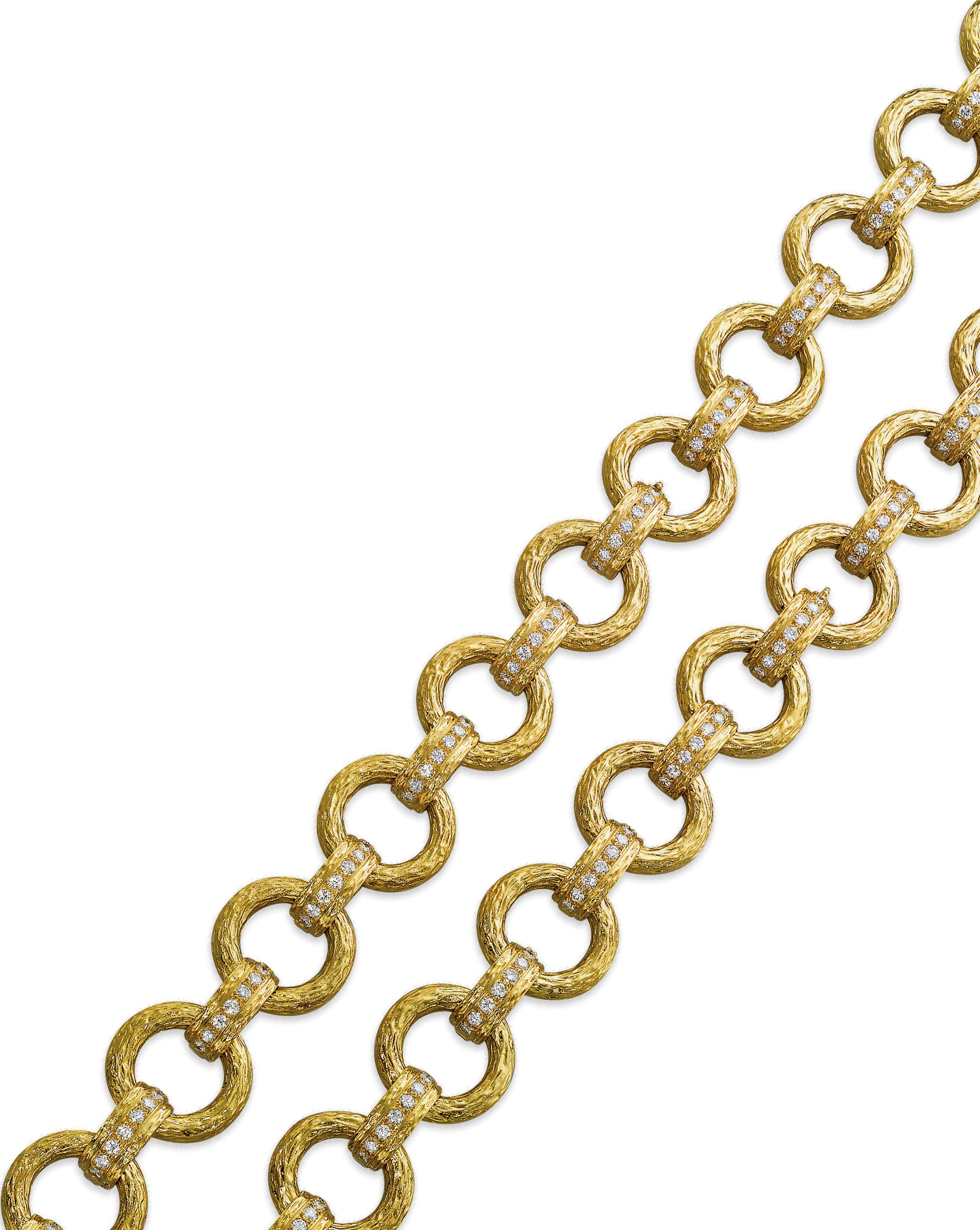 A YELLOW GOLD AND DIAMOND SAUTOIR