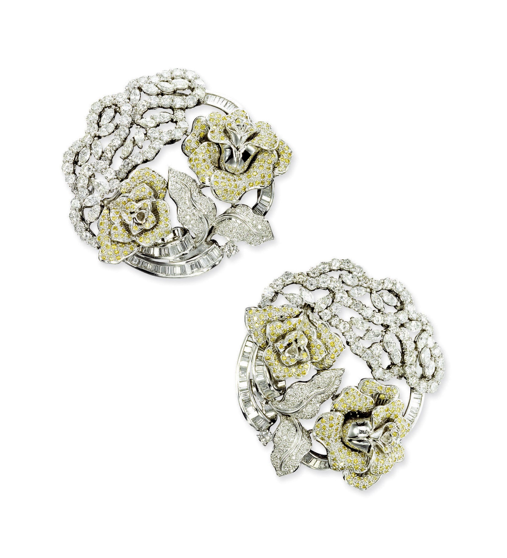 A PAIR OF DIAMOND FLORAL BROOCHES