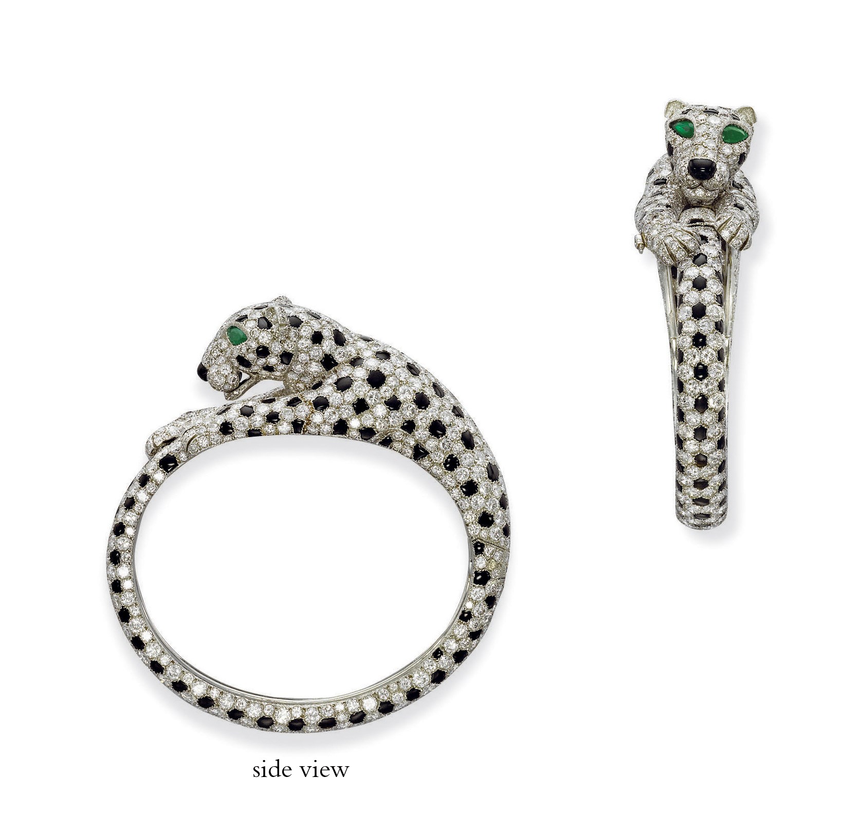 A DIAMOND AND ONYX PANTHER BANGLE, BY CARTIER