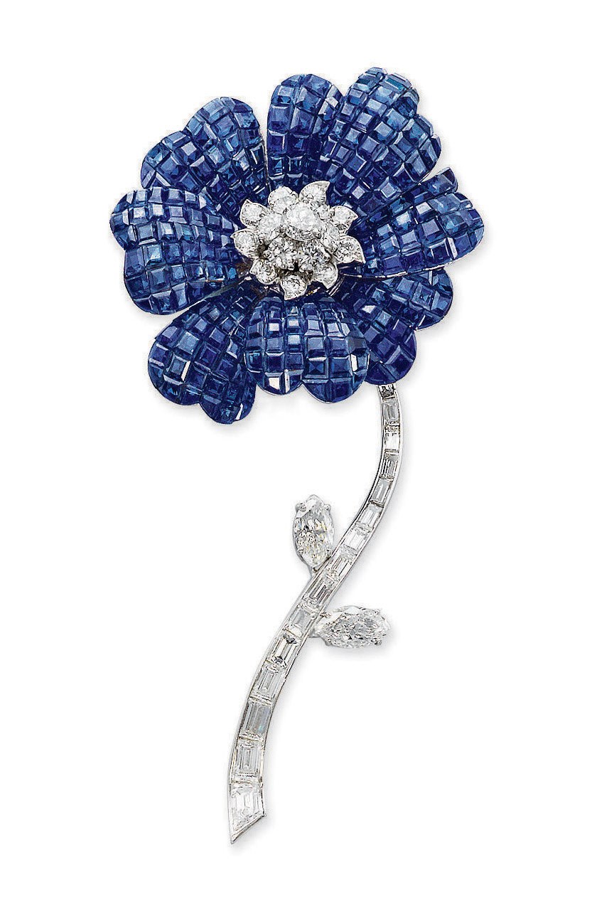 A 'MYSTERY-SET' SAPPHIRE AND DIAMOND PAVOT BROOCH, BY VAN CLEEF & ARPELS