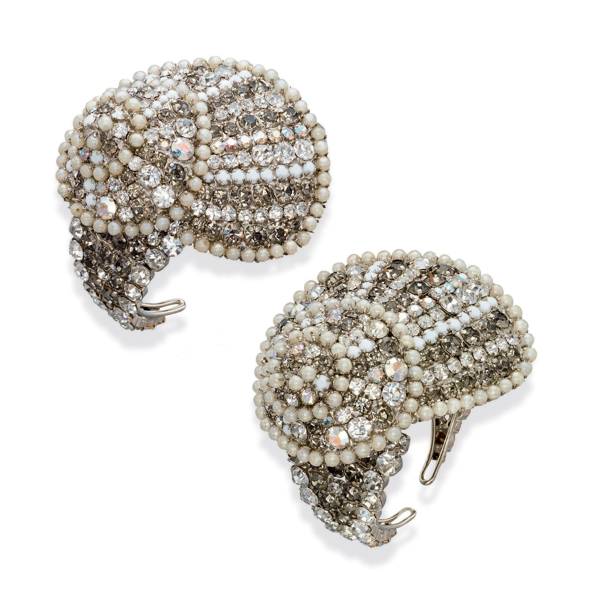 A PAIR OF PASTE AND SIMULATED PEARL SHELL CUFFS, BY YVES SAINT-LAURENT