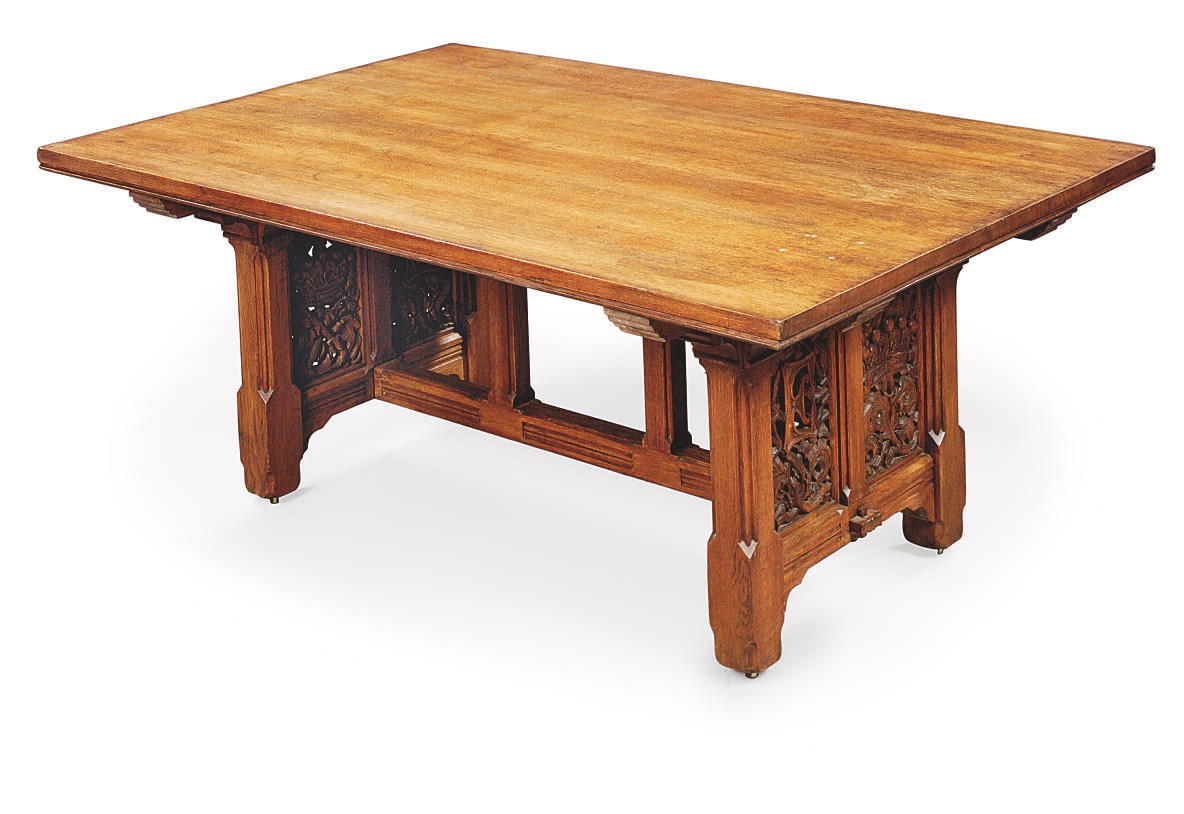A MID-VICTORIAN OAK LIBRARY TABLE