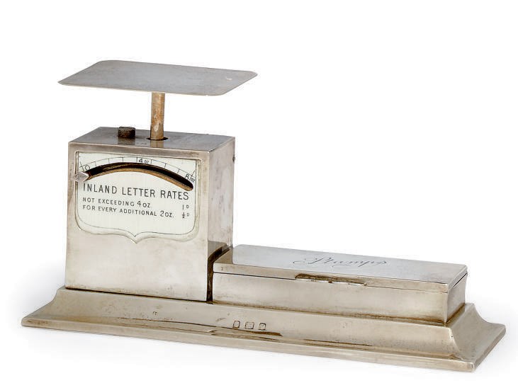 A NOVELTY SILVER COMBINATION POSTAL SCALE AND STAMP BOX