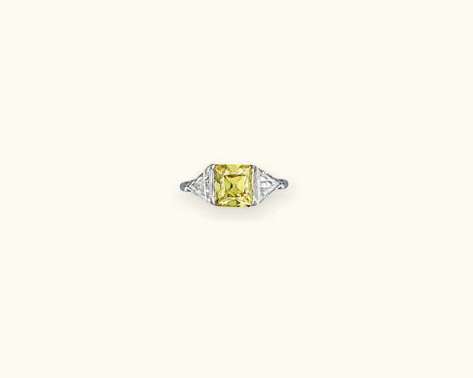 A COLOURED DIAMOND RING