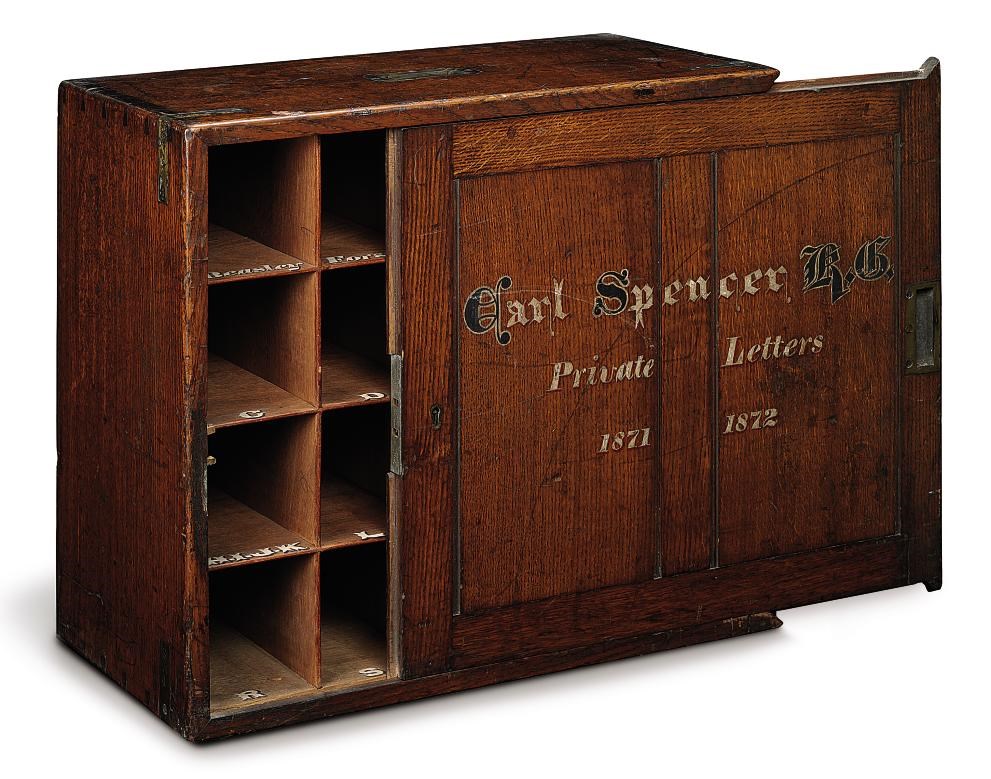 A VICTORIAN BRASS-BOUND OAK LETTER CABINET