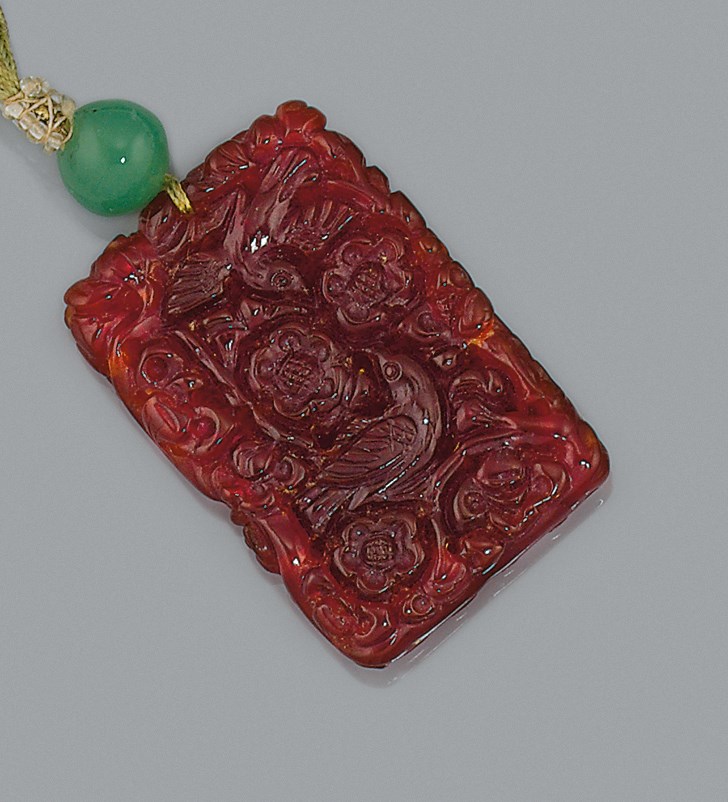 A Chinese amber pendant