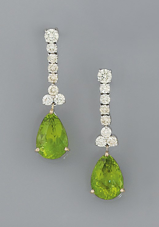 A pair of peridot and diamond earrings