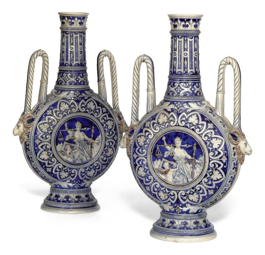 A PAIR OF GERMAN STONEWARE TWO-HANDLED VASES