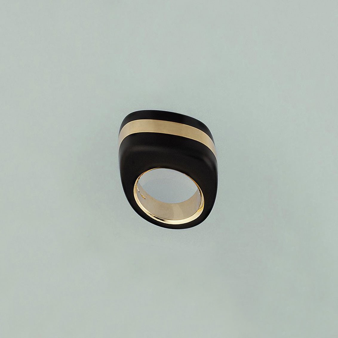 An ebony set ring, by Vhernier
