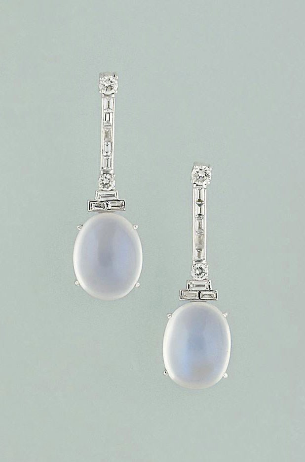 A pair of moonstone and diamond pendant earrings