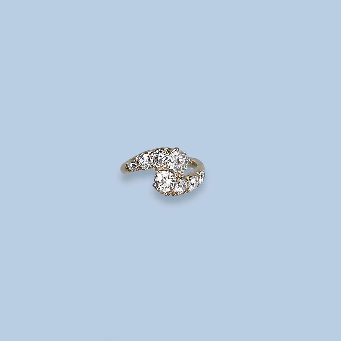 A DIAMOND CROSSOVER RING
