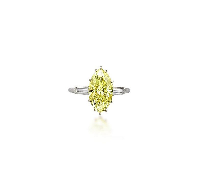 A COLOURED DIAMOND RING