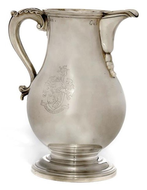 A LARGE SILVER BEER JUG OF GEORGE II STYLE