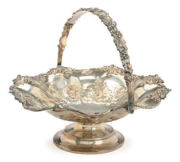 A SILVER-PLATED FOOTED CAKE BASKET WITH A SWING HANDLE,
