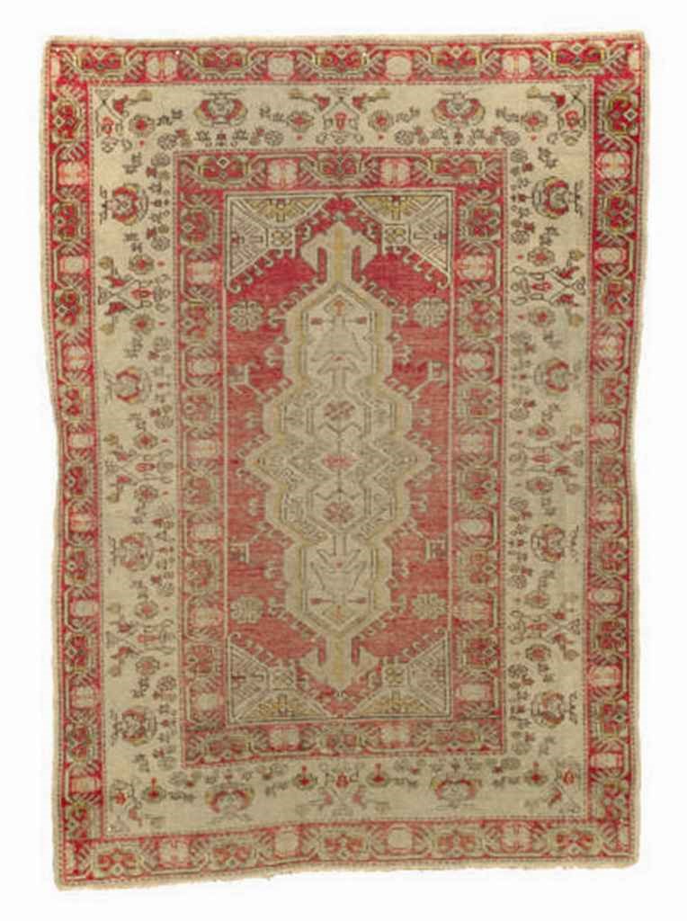 A GROUP OF SIX RUGS,