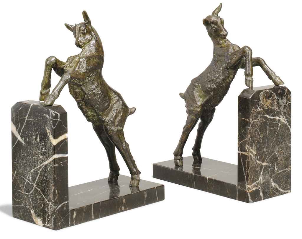 A PAIR OF ASINKO PATINATED-SPELTER AND MARBLE 'GOAT' BOOKENDS