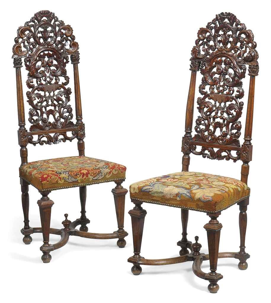 A PAIR OF MID VICTORIAN SOLID ROSEWOOD HIGH-BACK CHAIRS