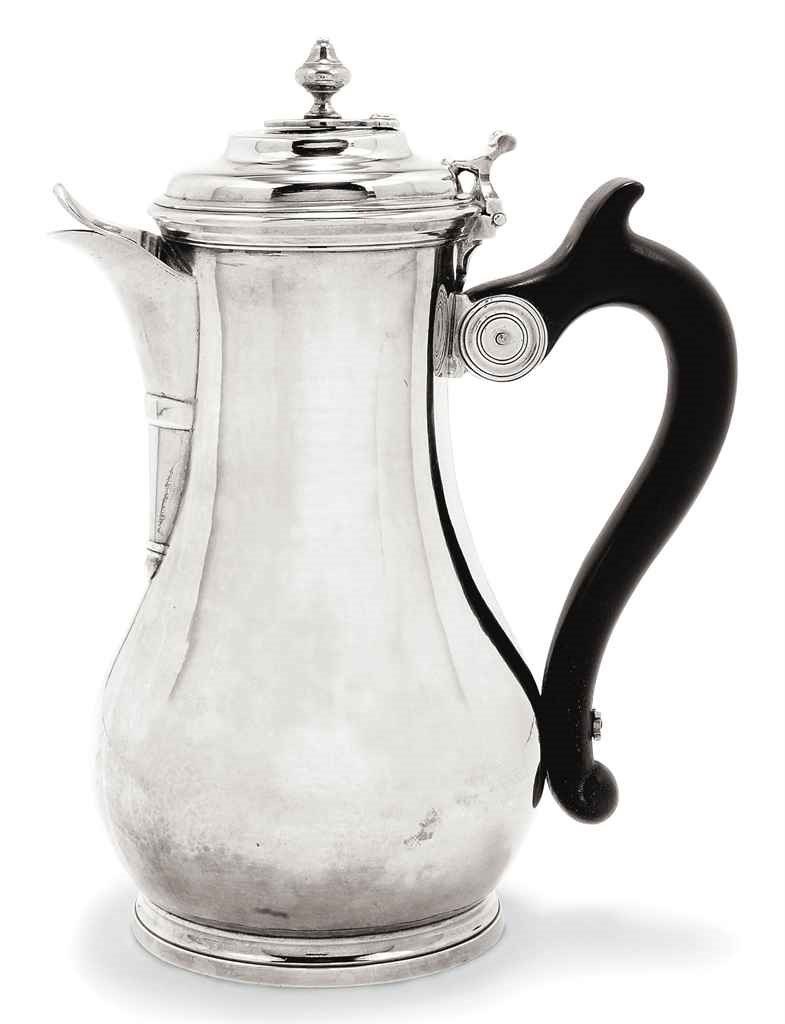 A FRENCH PROVINCIAL SILVER CHOCOLATE POT