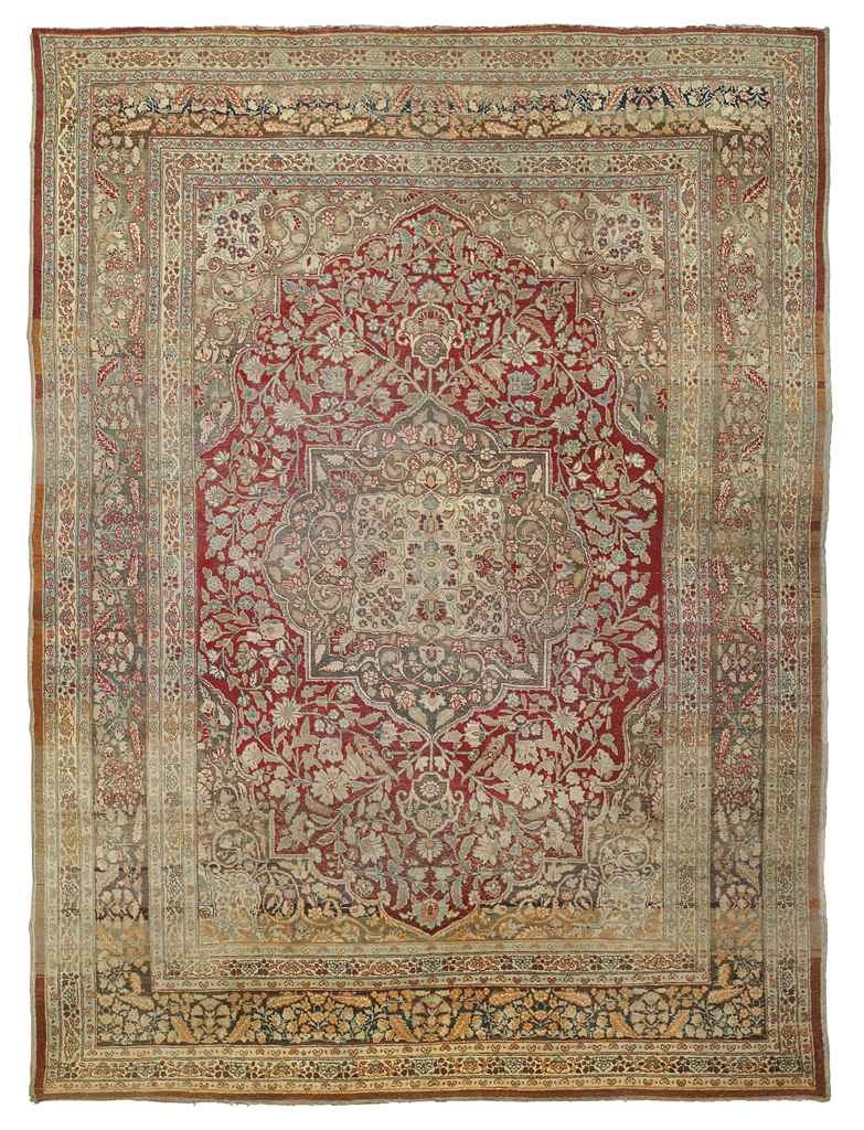 An antique Tabriz carpet