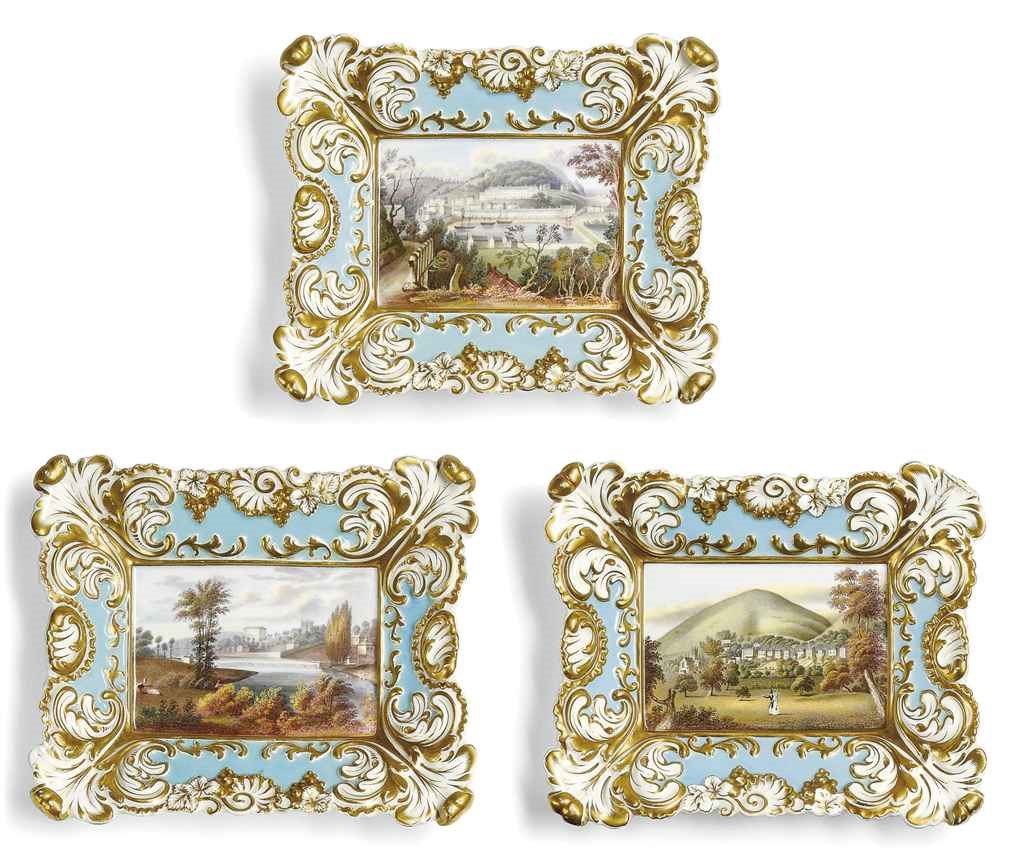THREE GRAINGER'S WORCESTER PALE-BLUE GROUND RECTANGULAR TOPOGRAPHICAL PLAQUES