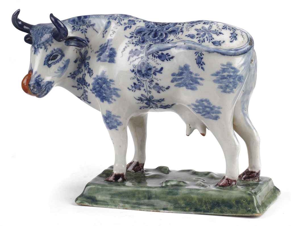 A Dutch Delft polychrome model of a cow