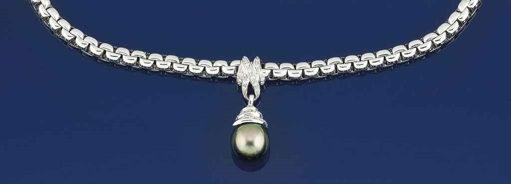 A cultured pearl and diamond pendant necklace