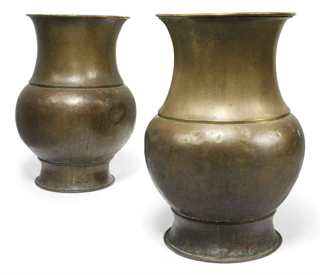 A PAIR OF HAMMERED-BRASS LARGE VASES