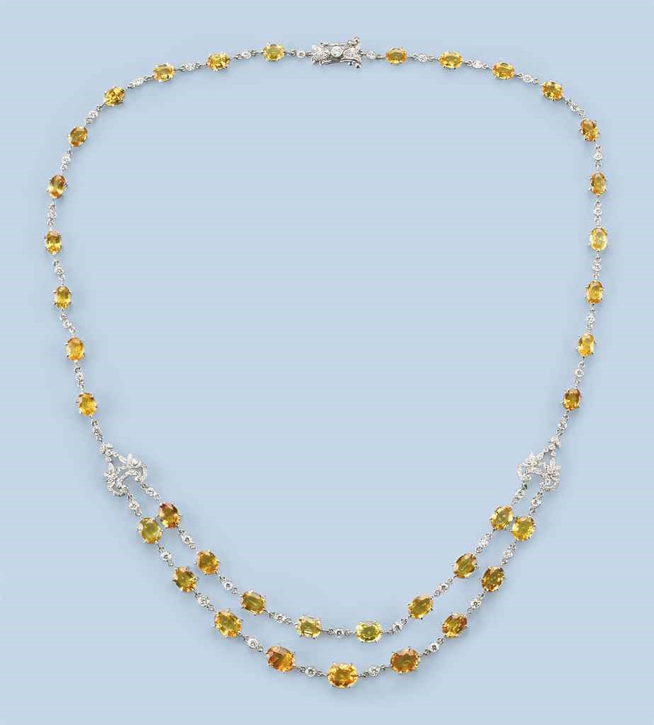 A YELLOW SAPPHIRE AND DIAMOND NECKLACE