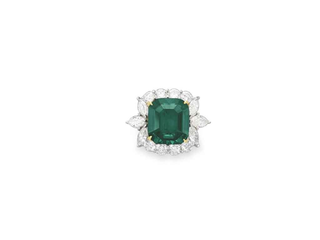 AN EMERALD AND DIAMOND RING