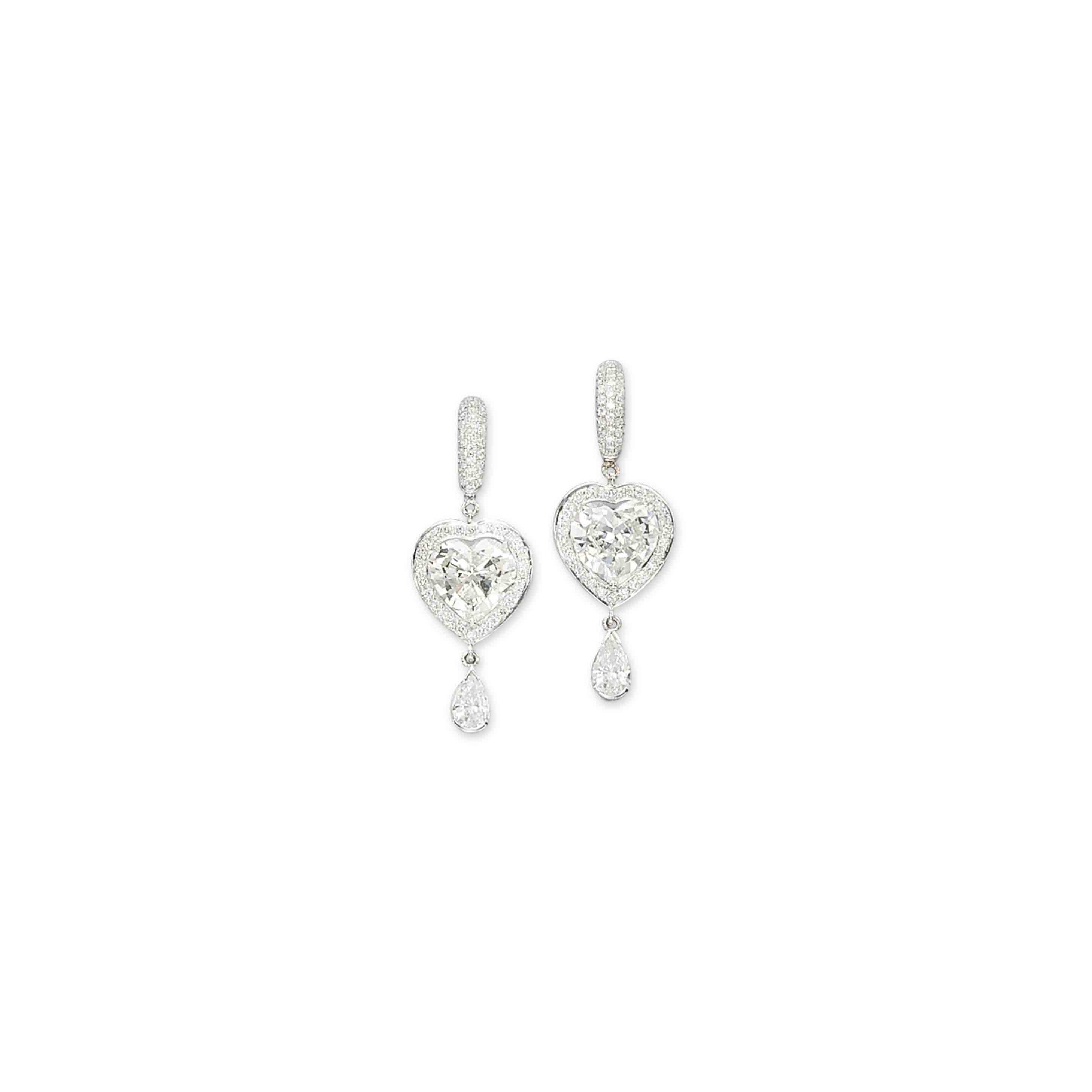A PAIR OF DIAMOND EARRINGS