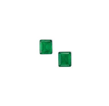 TWO UNMOUNTED EMERALDS