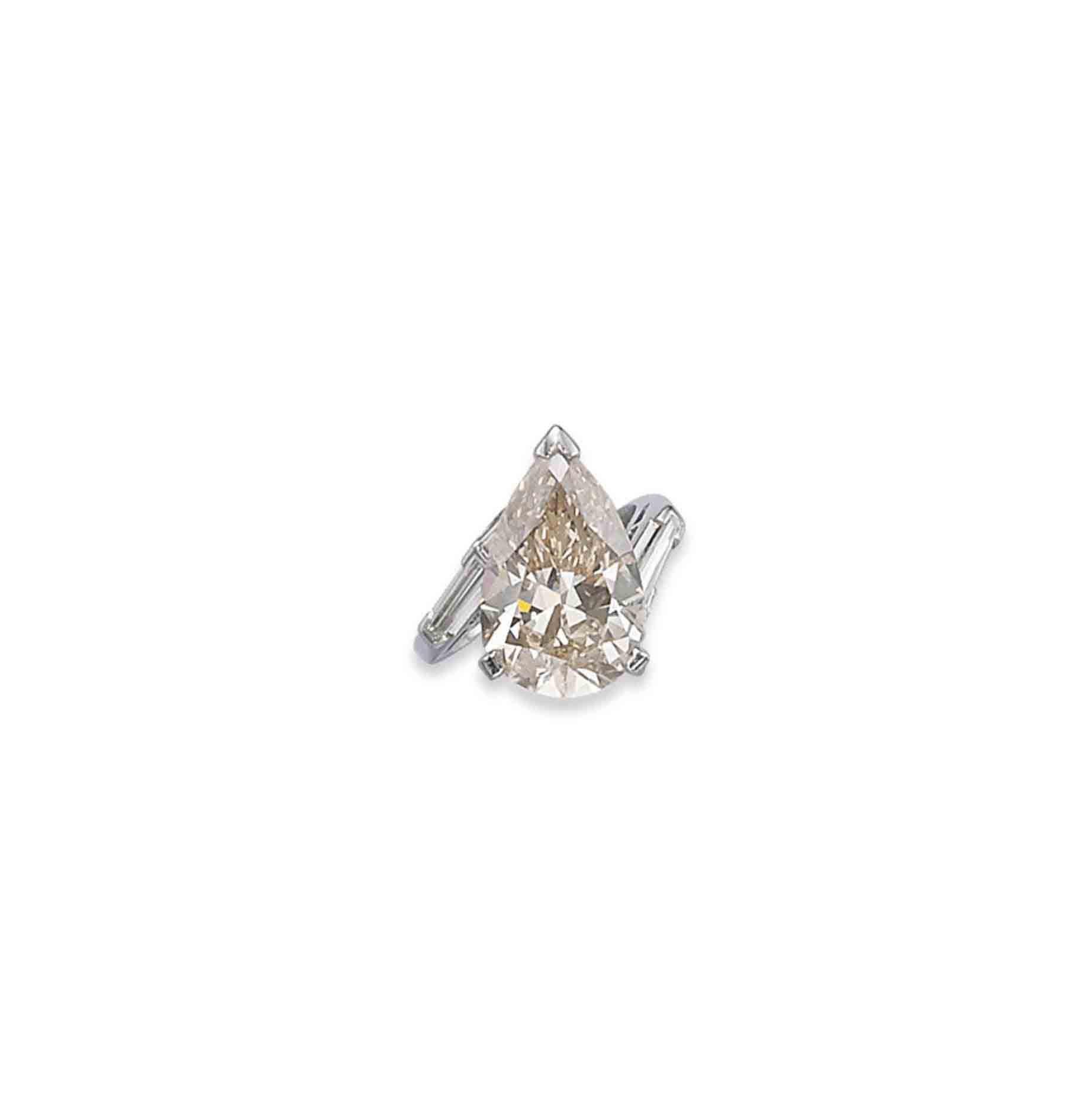A COLOURED DIAMOND RING