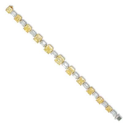 A DIAMOND AND COLOURED DIAMOND BRACELET